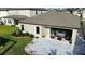 Aerial view of back yard with patio, landscaping and outdoor seating area at 12661 Oak Hill Way, Parrish, FL 34219