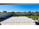 A spacious backyard features a stone paver patio and privacy fence, perfect for outdoor entertaining at 12661 Oak Hill Way, Parrish, FL 34219
