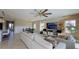 Open floor plan integrating living, dining, and kitchen areas, perfect for modern living and entertaining at 12661 Oak Hill Way, Parrish, FL 34219