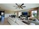 Open floor plan integrating living, dining, and kitchen areas, perfect for modern living and entertaining at 12661 Oak Hill Way, Parrish, FL 34219