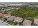 Aerial view of a beautiful community with houses and lush green spaces at 13107 Belknap Pl, Lakewood Ranch, FL 34211