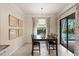 Bright dining area with table and chairs, view of pool at 13107 Belknap Pl, Lakewood Ranch, FL 34211