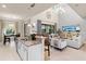 Island kitchen with granite countertops and stainless steel appliances at 13107 Belknap Pl, Lakewood Ranch, FL 34211