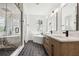 Spa-like bathroom with a soaking tub and walk-in shower at 2318 Bay St, Sarasota, FL 34237