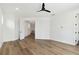 Bright bedroom with hardwood floors and a ceiling fan at 2318 Bay St, Sarasota, FL 34237