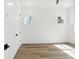 Spacious bedroom with hardwood floors and large windows at 2318 Bay St, Sarasota, FL 34237