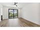 Spacious bedroom with sliding glass doors leading to a balcony at 2318 Bay St, Sarasota, FL 34237