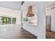 Modern kitchen with white shaker cabinets, stainless steel appliances, and quartz countertops at 2318 Bay St, Sarasota, FL 34237