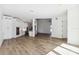 Open floor plan boasts a modern kitchen, dining area, and high ceilings at 2318 Bay St, Sarasota, FL 34237
