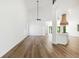 Open living room with high ceilings and a view of the kitchen at 2318 Bay St, Sarasota, FL 34237