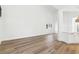 Spacious living room with hardwood floors and large windows at 2318 Bay St, Sarasota, FL 34237