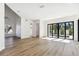 Bright and airy living room with hardwood floors and sliding glass doors at 2318 Bay St, Sarasota, FL 34237