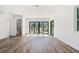 Spacious primary bedroom with access to the pool and a private bathroom at 2318 Bay St, Sarasota, FL 34237