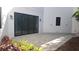 Modern patio with pavers and lush landscaping at 2318 Bay St, Sarasota, FL 34237
