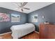 Cozy bedroom with terracotta tile floors and ceiling fan at 1841 Buccaneer Dr, Sarasota, FL 34231