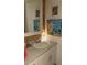 Bright bathroom with updated sink and coastal decor at 808 53Rd E Ave # 8, Bradenton, FL 34203