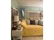 Cozy bedroom with a daybed and beach-themed decor at 808 53Rd E Ave # 8, Bradenton, FL 34203