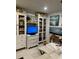 Relaxing living room featuring built-in shelving and comfortable seating at 808 53Rd E Ave # 8, Bradenton, FL 34203