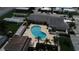 Aerial view of community pool and surrounding buildings at 808 53Rd E Ave # 8, Bradenton, FL 34203