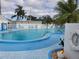 Inviting community pool with lounge chairs and a relaxing atmosphere at 808 53Rd E Ave # 8, Bradenton, FL 34203