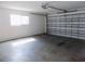 Spacious two-car garage with natural light, offering ample parking and storage solutions at 6555 Connecticut Ave, Sarasota, FL 34243