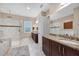 Elegant bathroom with granite vanity and large shower at 1259 Tyne Ln, Bradenton, FL 34208