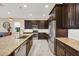 Modern kitchen with stainless steel appliances and granite countertops at 1259 Tyne Ln, Bradenton, FL 34208