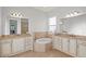 Elegant bathroom with double vanity, soaking tub, and separate shower at 5130 Tidewater Preserve Blvd, Bradenton, FL 34208