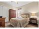 Cozy bedroom with a comfortable bed and wooden furniture at 5130 Tidewater Preserve Blvd, Bradenton, FL 34208