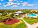 Aerial view of community pool, playground, and clubhouse at 5130 Tidewater Preserve Blvd, Bradenton, FL 34208