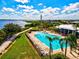 Resort-style pool overlooking the water with lounge chairs at 5130 Tidewater Preserve Blvd, Bradenton, FL 34208