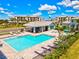 Bright, refreshing pool with plenty of lounge chairs at 5130 Tidewater Preserve Blvd, Bradenton, FL 34208