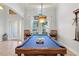 Spacious game room with a pool table and comfortable seating at 5130 Tidewater Preserve Blvd, Bradenton, FL 34208