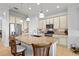 Gourmet kitchen with granite countertops and modern appliances at 5130 Tidewater Preserve Blvd, Bradenton, FL 34208