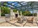 Relaxing outdoor lounge with fireplace and seating at 5130 Tidewater Preserve Blvd, Bradenton, FL 34208