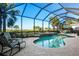 Inviting freeform pool with screened enclosure and water views at 5130 Tidewater Preserve Blvd, Bradenton, FL 34208