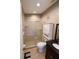 Bathroom with shower, toilet, vanity, and linen cabinet at 4105 33Rd Avenue W Dr # 4105, Bradenton, FL 34205