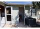 Exterior storage room with AC unit and open door at 4105 33Rd Avenue W Dr # 4105, Bradenton, FL 34205