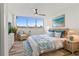 Main bedroom with a king-size bed, stylish decor, and ocean views at 1055 Beach Rd # B-302, Sarasota, FL 34242