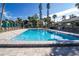 Inviting community pool with plenty of lounge chairs at 1055 Beach Rd # B-302, Sarasota, FL 34242