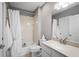 Clean bathroom with a bathtub, toilet and vanity at 7187 Boca Grove Pl # 202, Lakewood Ranch, FL 34202