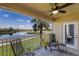 Relaxing screened patio offering breathtaking views of the lake and golf course at 7187 Boca Grove Pl # 202, Lakewood Ranch, FL 34202