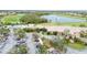 Community clubhouse with parking and landscaping at 115 Winding River Trl, Bradenton, FL 34212