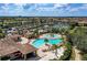 Resort-style pool with lounge chairs and sand area at 115 Winding River Trl, Bradenton, FL 34212