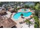 Resort-style pool with lounge chairs and sand area at 115 Winding River Trl, Bradenton, FL 34212
