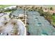 Well-maintained tennis courts with ample parking at 115 Winding River Trl, Bradenton, FL 34212