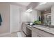 Bathroom with granite countertops, double sinks, and a walk-in shower at 8720 Bellussi Dr, Sarasota, FL 34238