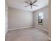 Simple bedroom with neutral walls and carpeted floors at 8720 Bellussi Dr, Sarasota, FL 34238