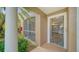 Inviting front entry with view into the updated interior at 8923 Manor Loop # 106, Lakewood Ranch, FL 34202