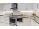 Sleek kitchen with stainless steel appliances, modern cabinetry, and neutral countertops for a contemporary feel at 111 S Pineapple Ave # 613, Sarasota, FL 34236